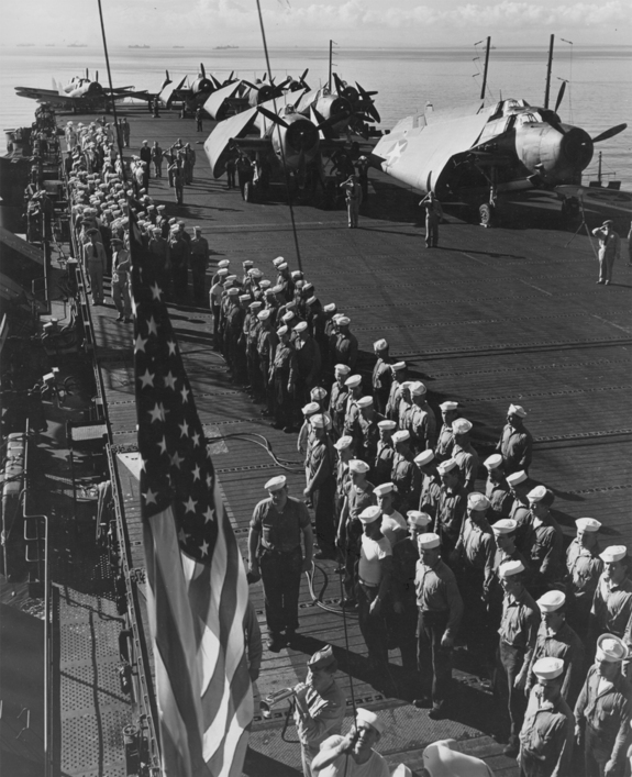 wwii-era-aircraft-carrier-5-flight-deck-sailors-attention-to-colors_national-archives