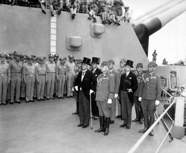 Japanese surrender signatories arrive aboard the USS MISSOURI in Tokyo Bay to participate in surrender ceremonies.  September 2, 1945. (Army)  NARA FILE #:  111-SC-210626  WAR & CONFLICT BOOK #:  1362