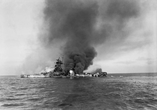 The_German_pocket_battleship_ADMIRAL_GRAF_SPEE_in_flames_after_being_scuttled_off_Montevideo,_Uruguay,_after_the_Battle_of_the_River_Plate,_17_December_1939._A6
