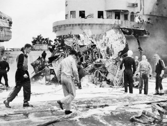 The_remains_of_a_Japanese_Kamikaze_aircraft_that_crashed_on_board_HMS_FORMIDABLEoff_the_Sakishima_Islands,_May_1945._ABS227