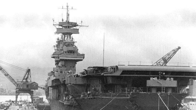 Repairs from the Battle of the Coral Sea Courtesy of the Naval History and Heritage Command The USS Yorktown undergoes urgent repairs at Dry Dock # 1 in the Pearl Harbor Navy Yard, 29 May 1942, following damage sustained in the Battle of the Coral Sea. It left Pearl Harbor the next day to participate in the Battle of Midway.