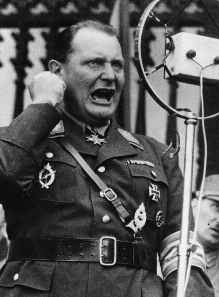 circa 1935: Hermann Wilhelm Goering (1893 – 1946), the German politico-military leader, shouting down a microphone at a rally. (Photo by Three Lions/Getty Images)