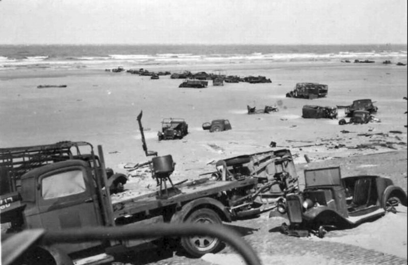 Abandoned British military vehicles on beach of Dunkirk. May 26 1940 had an operation to evacuate across the sea to Britain British, French and Belgian troops