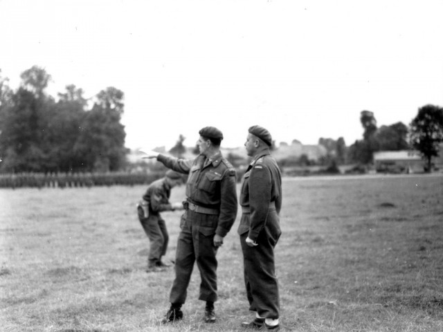 Le 2 août 1944, inspection de la 7th Brigade de la 3rd Canadian Inf. Div.par le Maj.Gen.l Rodney Frederick Leopold Keller. De gauche à droite :  -Le Brigadier Harry Wickwire Foster, commandant de la 7th Cdn Brigade -Le Maj. Gen.Keller, commandant de la 3rd Cdn ID. Voir la p010908 http://www.flickr.com/search/?w=58897785%40N00&q=p010908&m=text