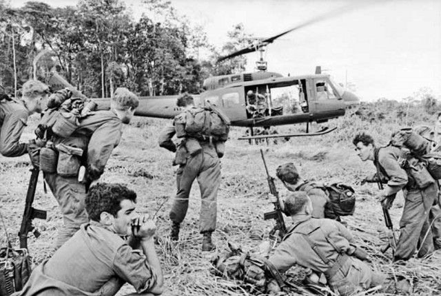 In November 1967 a 9 Squadron Iroquois lands to pick up members of the 7th Battalion Royal Australian Regiment (7RAR) during operation Santa Fe, a gruelling three week-long operation through inhospitable country some 23 kilometres from the Task Force Base at Nui Dat. [AWM COL/67/1127/VN] Mid Caption: Minister for Defence Materiel Jason Clare today, 11th July, 2011, announced that six additional Iroquois helicopters will be reserved for sale to historical organisations.