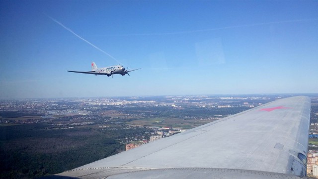 150827-dc-3-flying-over-moscow-yh-1034a_bcafa732249e8537efbcb8360bd5d6e5.nbcnews-ux-2880-1000
