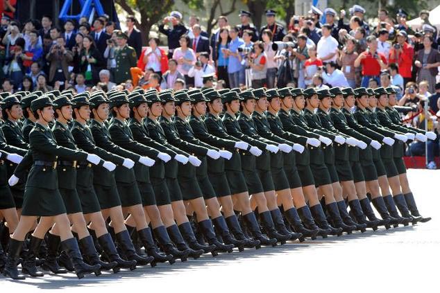 Chinese People's Liberation Army (PLA) female soldiers march during the National Day parade in Beijing, on 1 October 2009.