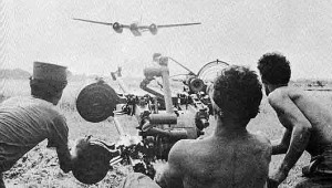 Cuban ground forces shooting at an FAL bomber plane on April 15