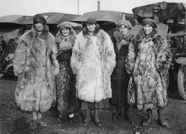 Five FANY members standing before Red Cross trucks outside Paris