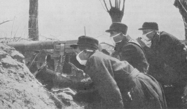 Belgian troops wearing early gas masks, 1915