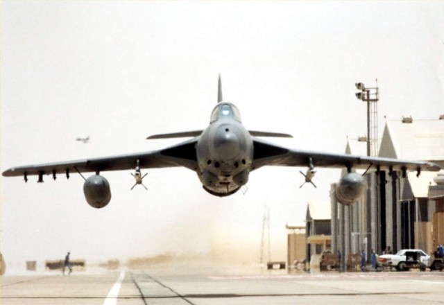 A particularly heart stopping photo of a Hawker Hunter of the Sultan of Oman's Air Force beating up the base at Thumrait. Vintagewings.ca