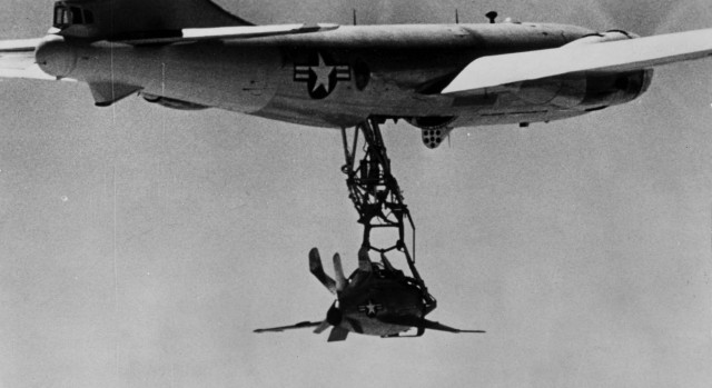 Although the XF-85 handled well, the test pilots reported that the airflow around the parent aircraft made it difficult to attach the hook to the trapeze. (U.S. Air Force photo)