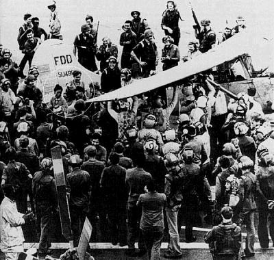 Midway_crew_surround_Major_Buang_and_his_family