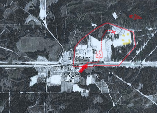 Aerial photograph of the Sobibór perimeter. taken likely before 1942. Permanent structures are not there yet, including Camp II barracks (lower centre), Camp III, and Camp IV. The railway unloading platform (with visible prewar railway station) is marked with the red arrow; the location of gas chambers is marked with a cross. The undressing area, with adjacent "Road to Heaven" through the forest, is marked with a red square. (Wikipedia)