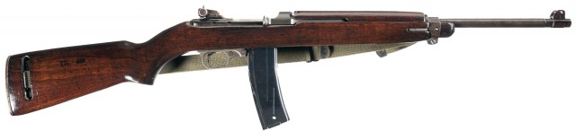 This is a late WWII M1 Carbine as manufactured by Winchester that was subsequently converted to the fully automatic M2 configuration.