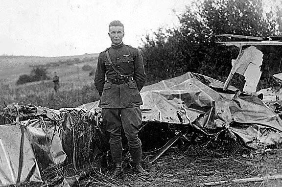 Luke with the wreckage of the Halberstadt that had been his 14th victory