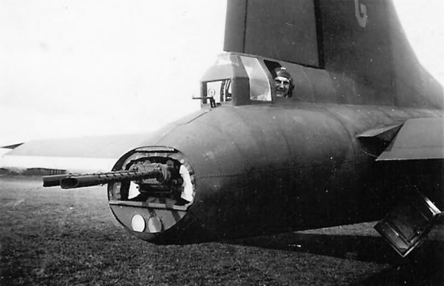 B-17_Flying_Fortress_Tail_Gunner_Posed_in_His_Position