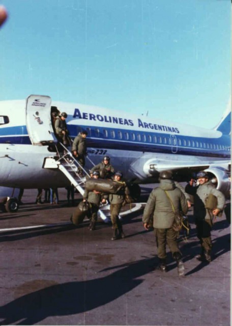 Argentine soldiers being flown in after the initial surrender of the island.