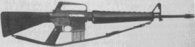 An early M16 rifle: note "duckbill" flash suppressor, triangular grip, forward assist, and the lack of brass deflector