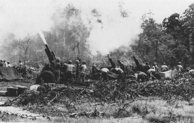 U.S. 105 mm artillery battery in action in the Central Highlands
