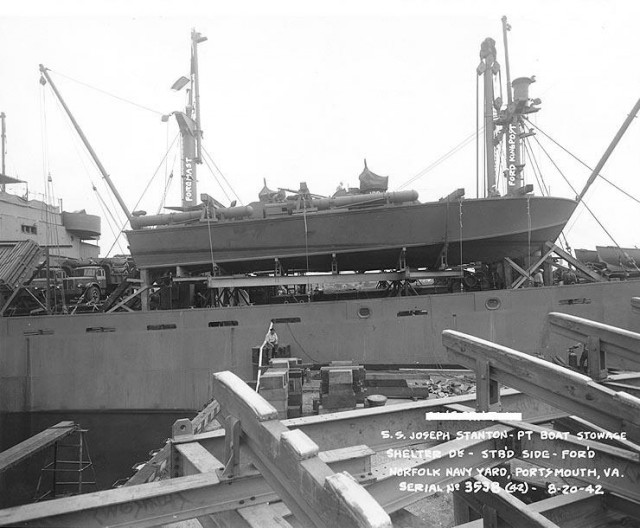 PT-109 stowed on board the liberty ship SS Joseph Stanton for transport to the Pacific, 20 August 1942