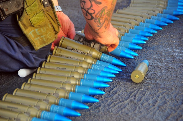 M793 Target Practice with Tracer (TP-T) rounds for the MK-38 being inspected.