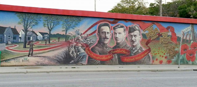 The Valour Road Mural showing (from right to left) Hall, Clarke, and Shankland
