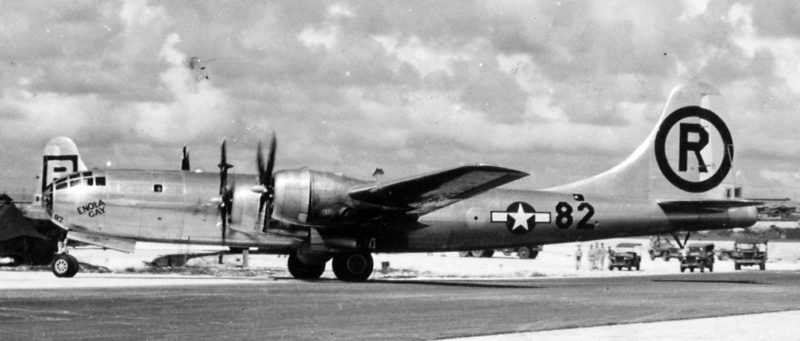Enola Gay after Hiroshima mission, entering hard-stand. It is in its 6th Bombardment Group livery, with victor number 82 visible on fuselage just forward of the tail fin.