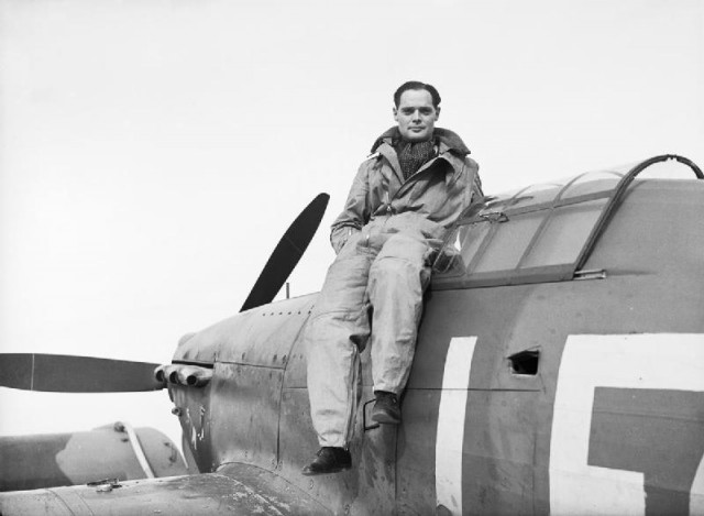 Douglas Bader sitting on his Hawker Hurricane via commons.wikimedia.org