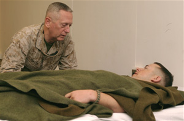 General Mattis visiting a wounded Marine in Iraq via http://www.1stmlg.marines.mil/News/NewsArticleDisplay/tabid/8628/Article/543180/i-mef-commander-visits-taqaddum.aspx - PD