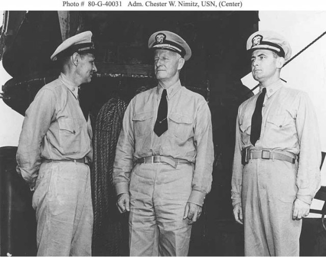 On board the USS San Francisco Lt. Commander Schonland (left), Admiral Nimitz, and Lt. Commander Bruce McCandless (right) via history.navy.mil