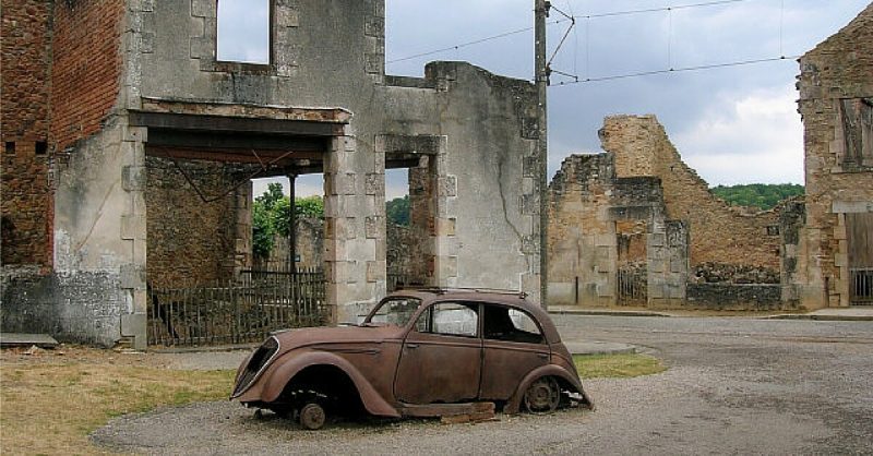 Many burnt our cars and other belongings can be seen to this day in Ordadour-sur-Glane. By TwoWings, slight edit by Calibas - CC BY-SA 3.0