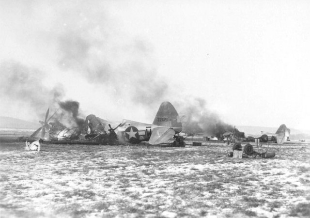 P-47s and Y-34s burning at an American airfield, Metz-Frescaty