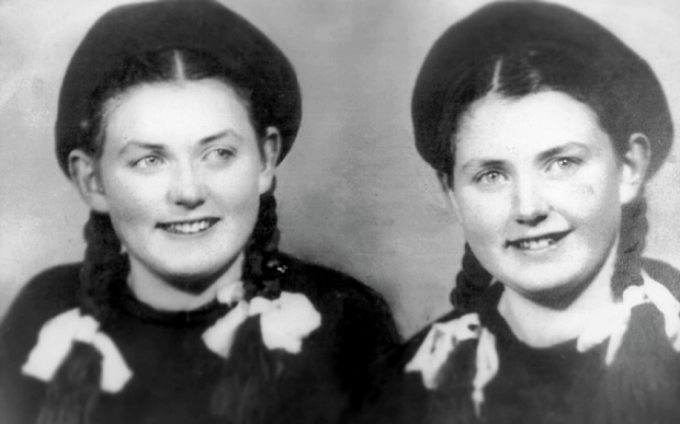 Eva Kor, left, and her twin sister Miriam