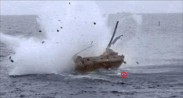The Chinook crashes while Nguyen (circled in red) bobs a few feet away