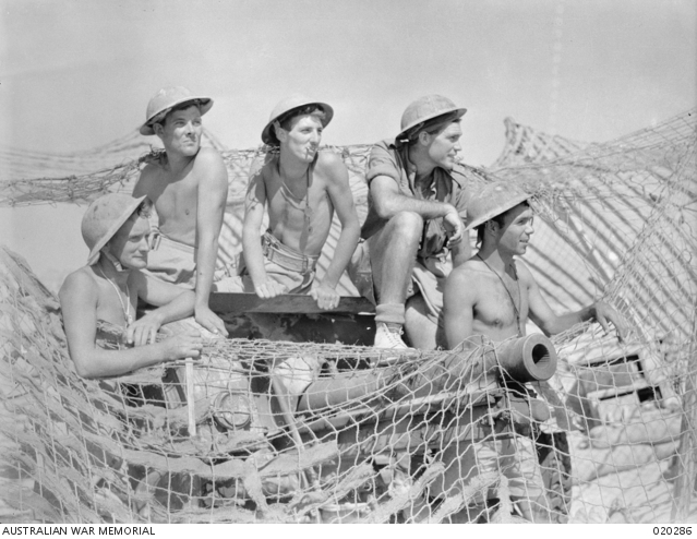 https://www.awm.gov.au/exhibitions/tobruk/ Soldiers of the Australian 2/17th Infantry Battalion posing for the cameras outside Tobruk