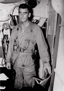 An exhausted Evans Carlson after returning to the "Nautilus" after the raid has ended. Note the blood on his P41 uniform.