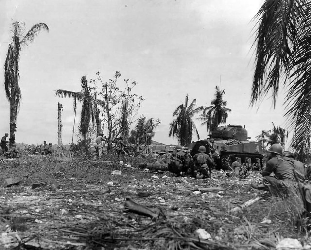 M4_Sherman_and_troops_Advance_on_Japanese_Pillbox_at_Orote_Point_Guam