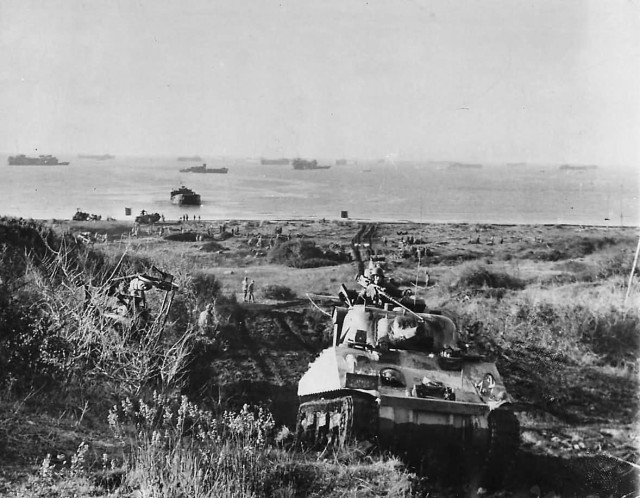 M4_Sherman_of_the_751st_Tank_Battalion_Moves_Inland_from_Nettuno_Invasion_Beach_January_1944