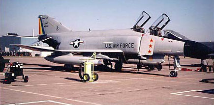 Side view of McDonnell Douglas F-4C-21-MC (S/N 64-660) of the New York Air National Guard. Note that the three victory stars were scored on May 12, 1966, by Maj. W.R. Dudley (pilot) and 1Lt. I. Kreingelis (WSO) flying for the 390th TFS, 35th TFW using an AIM-9 Sidewinder against a MiG-17; May 14, 1967, by Maj. J.A. Hargrove (pilot) and 1Lt. S.H. Demuth (WSO) flying for the 480th TFS, 366th TFW using the 20mm cannon against a MiG-17; and June 5, 1967, by Maj. D.K Preister (pilot) and Capt. J.E. Pankhurst (WSO) flying for the 480th TFS, 366th TFW using the 20mm cannon against a MiG-17. (U.S. Air Force photo)