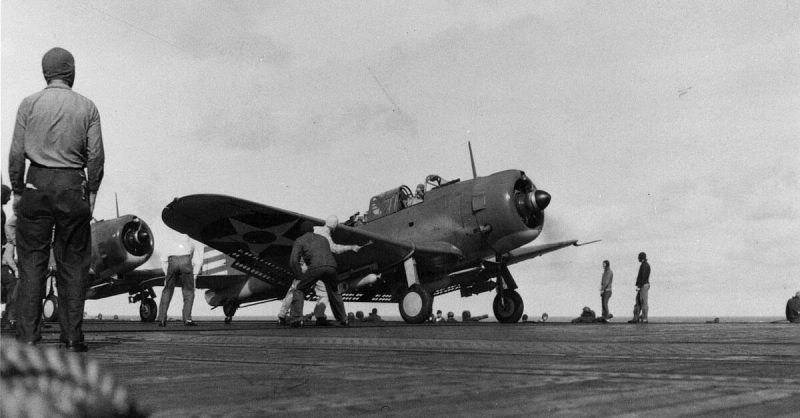 A bomb-laden SBD-2 Dauntless dive bomber prepares to take off from the U.S. carrier Enterprise during the raids on February 1.