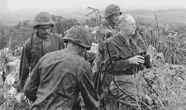 Edson surveying the frontlines on Tinian via commons.wikimedia.org