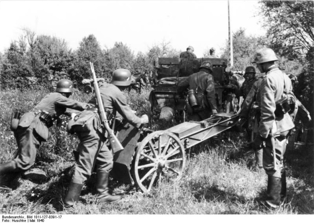 German soldiers with a 7.5cm le.IG 18 infantry gun, Maginot Line, France, May 1940