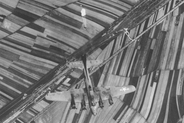 Bailout from a Boeing B-17F of the 483rd Bomb Group, 815th Bomb Squadron, over the Weiner Neustadt, Austria rail yards, at 5:10 p.m. on Nov. 9, 1943. The aircraft is at 22,500 feet with two engines fethered. Two crewmen had already bailed out. (U.S. Air Force photo)