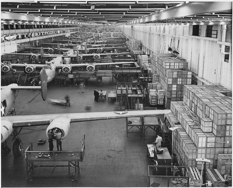 Looking up one of the assembly lines at Ford's big Willow Run plant, where B-24E (Liberator) bombers are being made in great numbers.