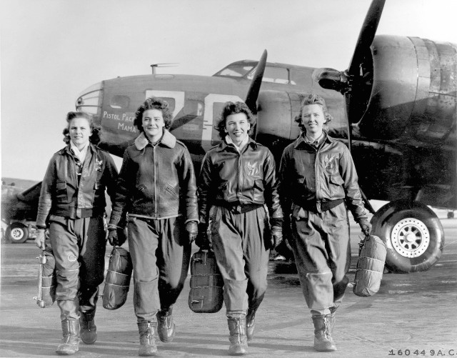 These four female pilots leaving their ship at the four engine school at Lockbourne are members of a group of WASPS who have been trained to ferry the B-17 Flying Fortresses. (U.S. Air Force photo)