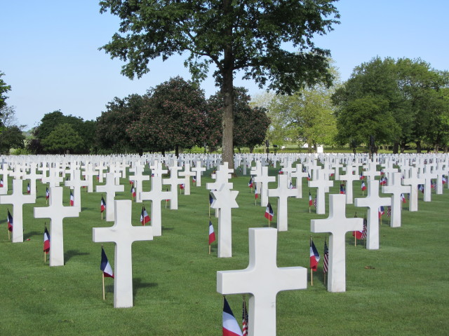 An American flag and French flag were placed in front of every headstone at Brittany American Cemetery in France in preparation for Memorial Day 2014.