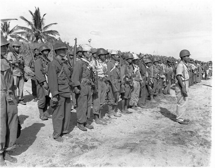 Filipino guerrillas standing in a line