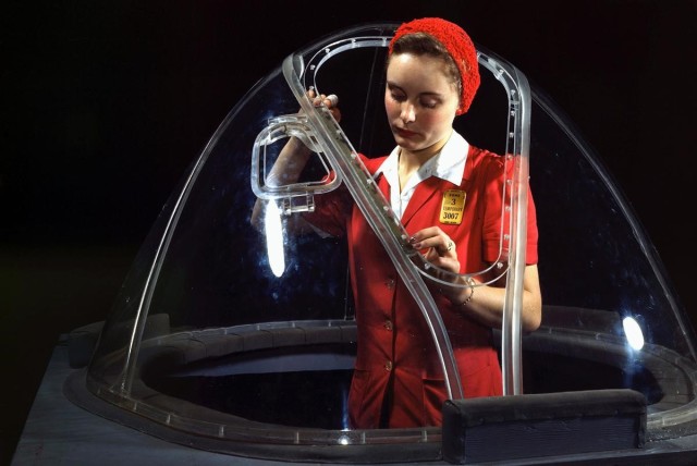 this-girl-in-a-glass-house-is-putting-finishing-touches-on-the-bombardier-nose-section-of-a-b-17f