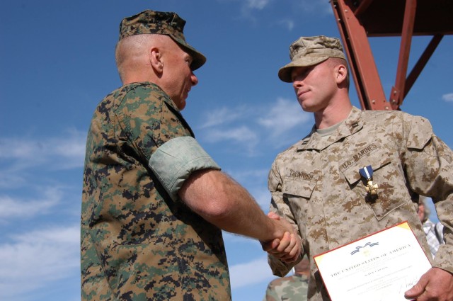 Chontosh receiving his Navy Cross via taskandpurpose.com